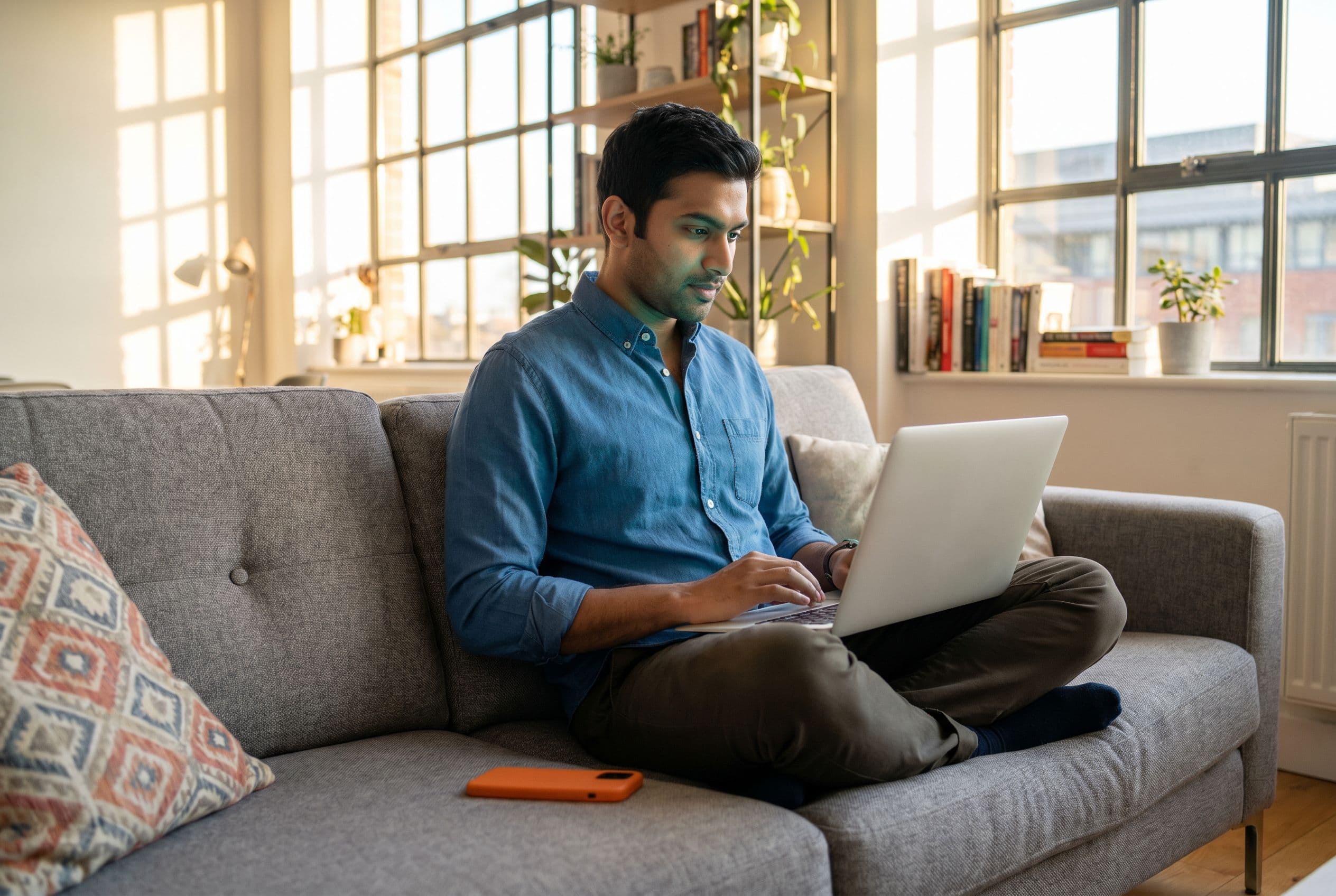 A professional adding a source to Capacity on a laptop.